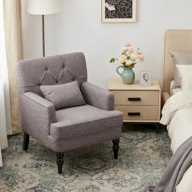 Fauteuil capitonné avec accoudoirs