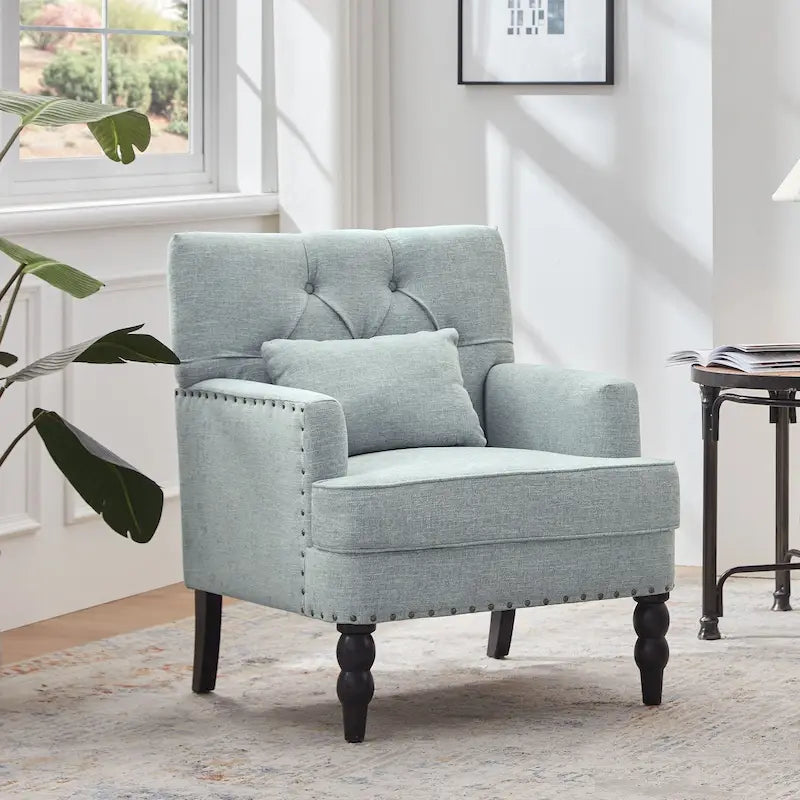 Fauteuil capitonné avec accoudoirs