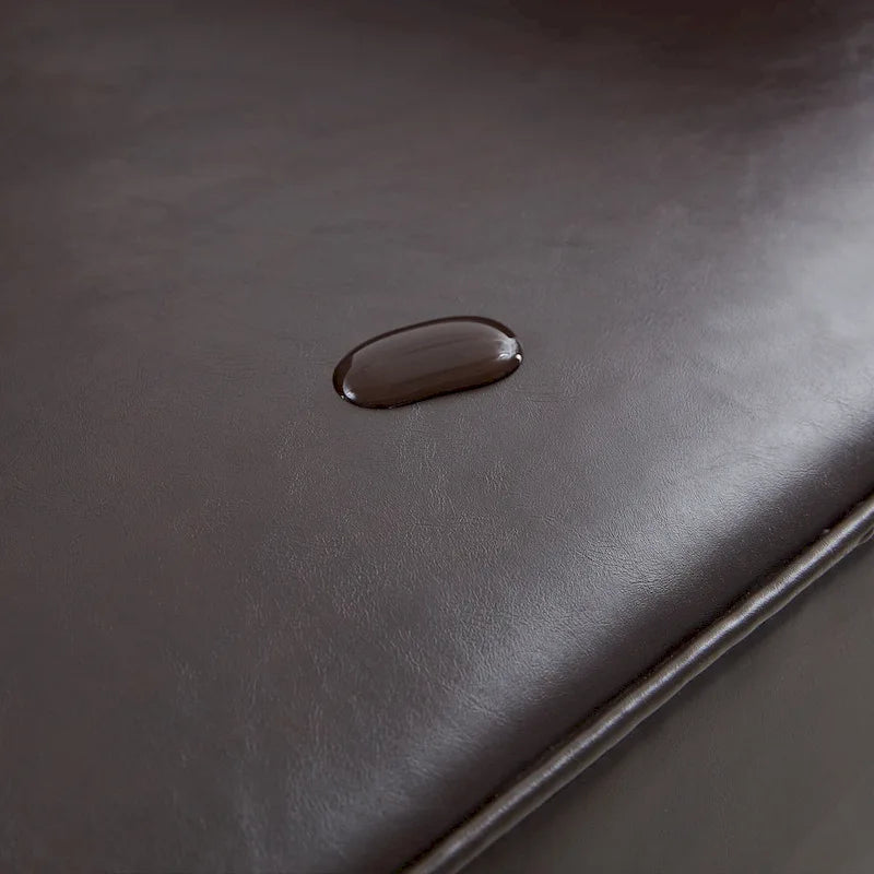 Fauteuil capitonné avec accoudoirs