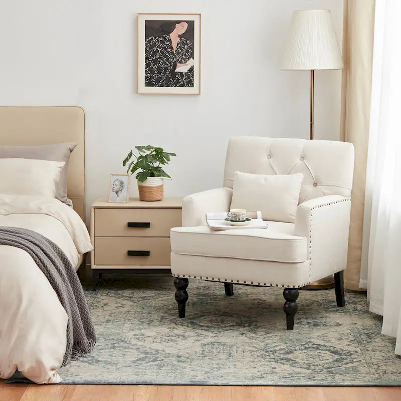 Fauteuil capitonné avec accoudoirs