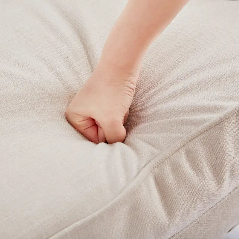 Fauteuil capitonné avec accoudoirs