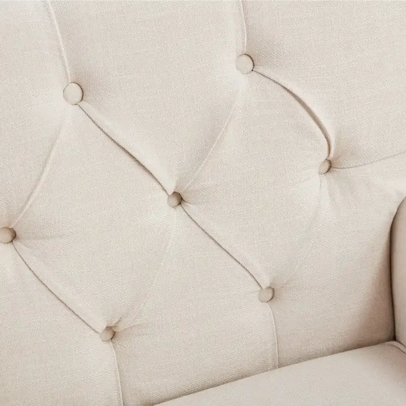Fauteuil capitonné avec accoudoirs