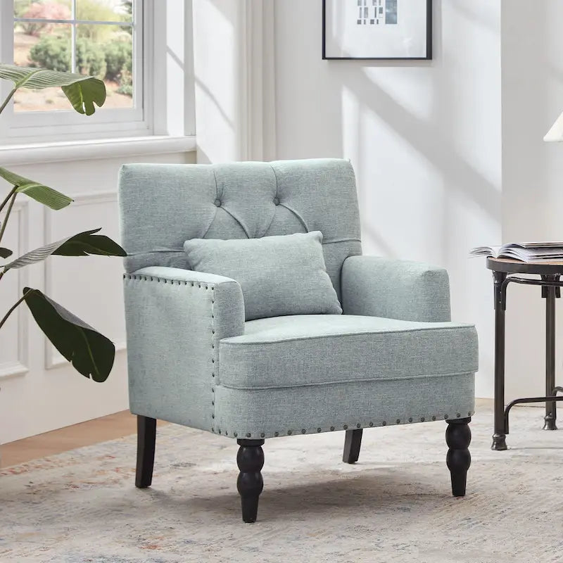 Fauteuil capitonné avec accoudoirs