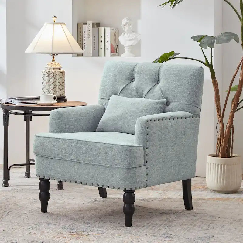 Fauteuil capitonné avec accoudoirs