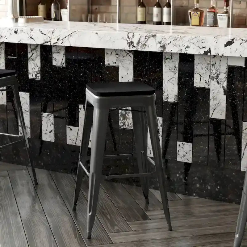 Tabouret de bar sans dossier avec assise en polyrésine