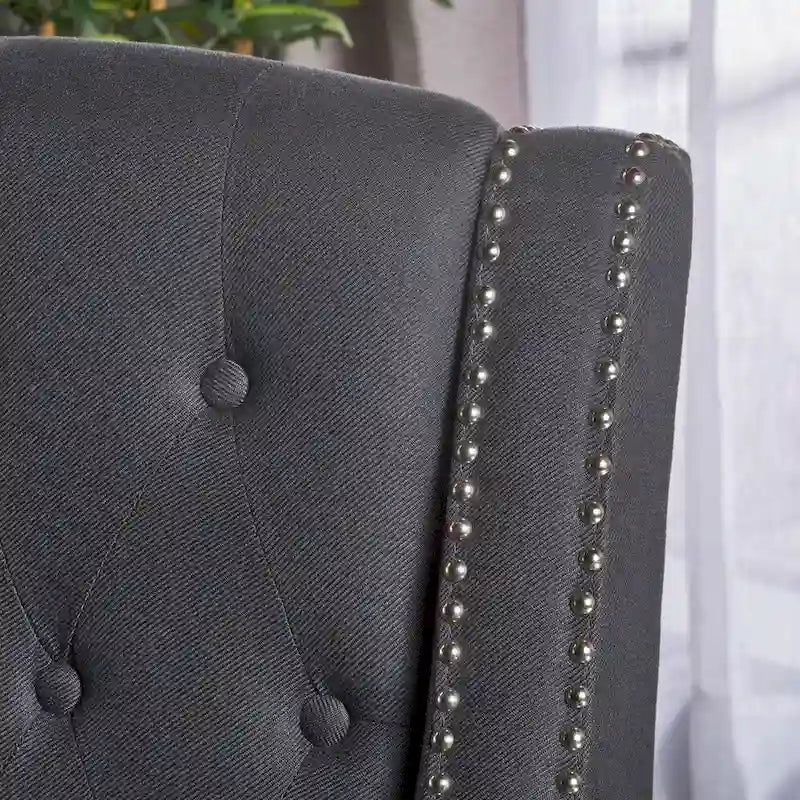 Fauteuil inclinable en tissu capitonné